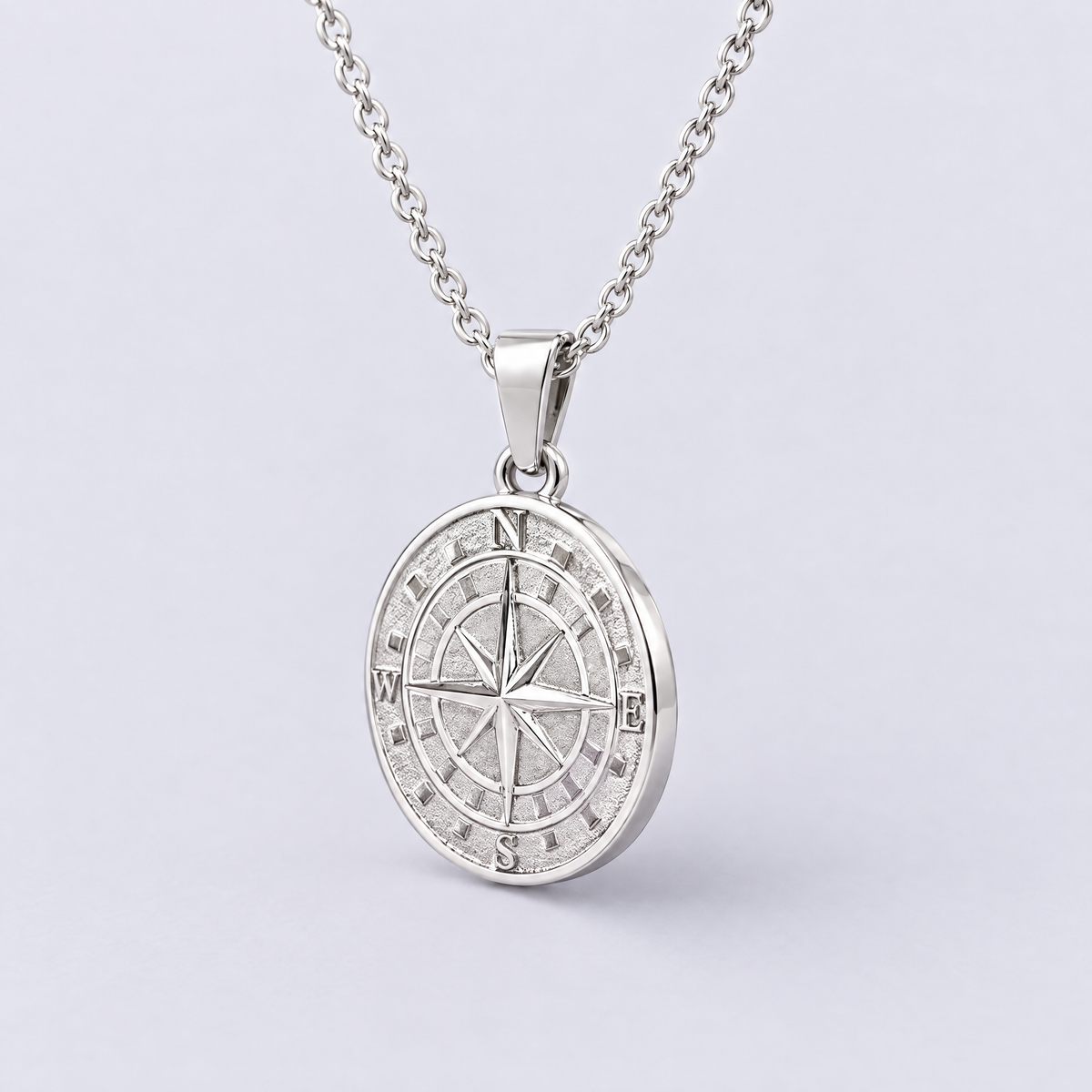 White gold compass pendant necklace side view