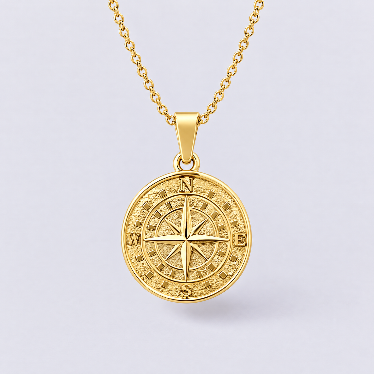 Gold compass pendant necklace front view