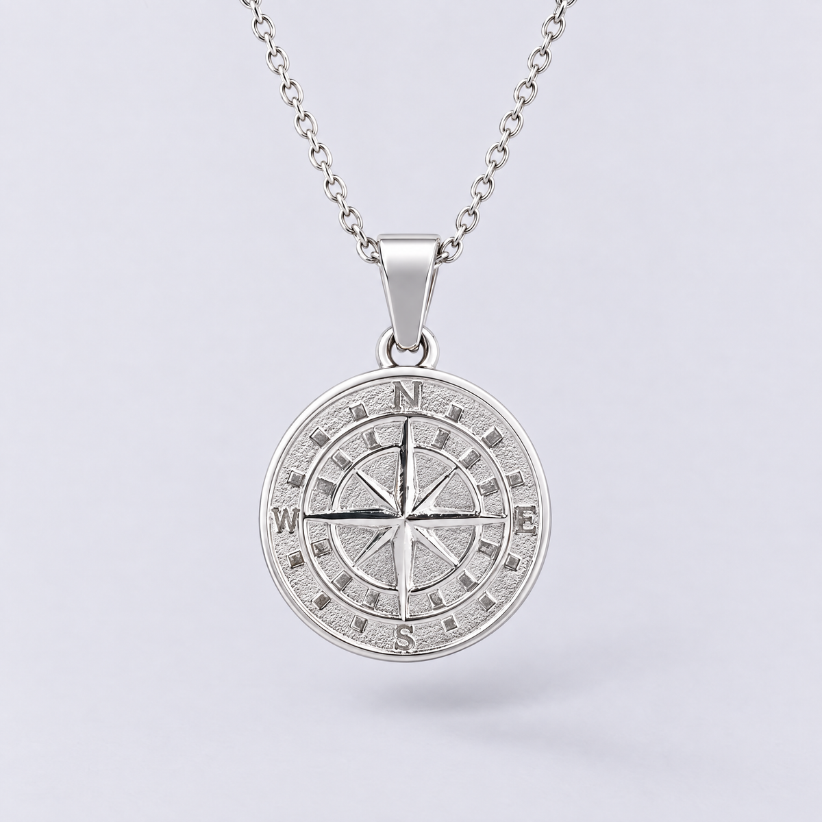 White gold compass pendant necklace front view